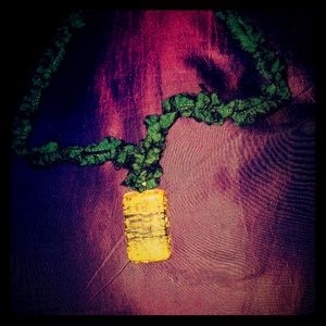 Handmade resin necklace.